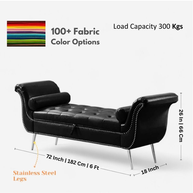 A black velvet button tufted 3-seater sofa with gold legs, placed in a living room setting with a grey throw blanket and a decorative plant in the background.