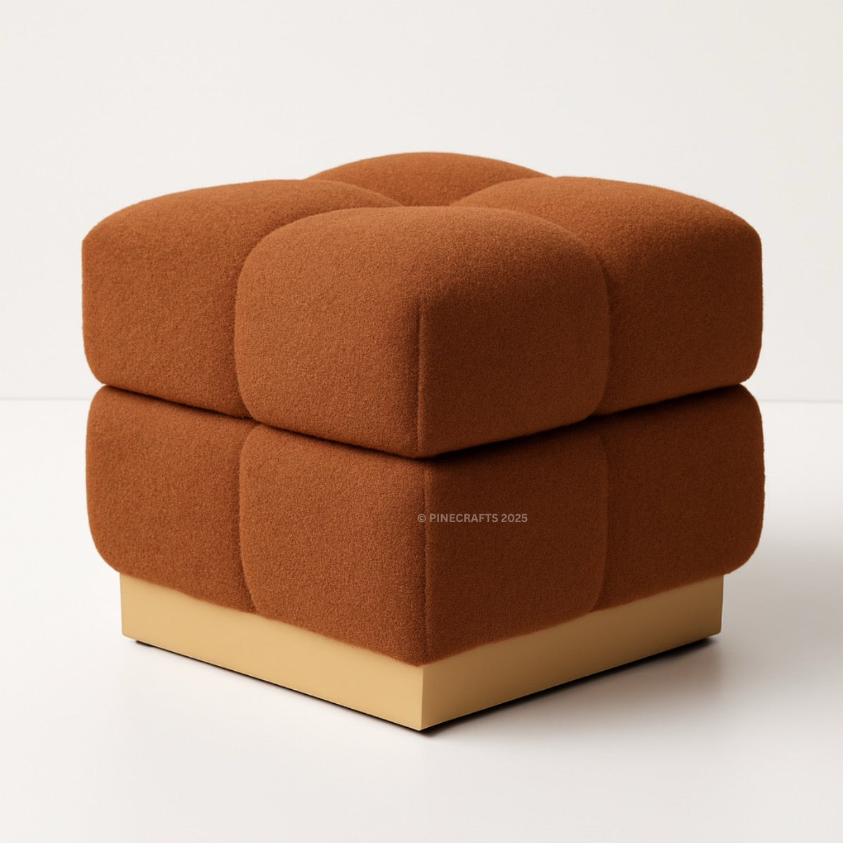 Brown cushioned cube ottoman on a white background