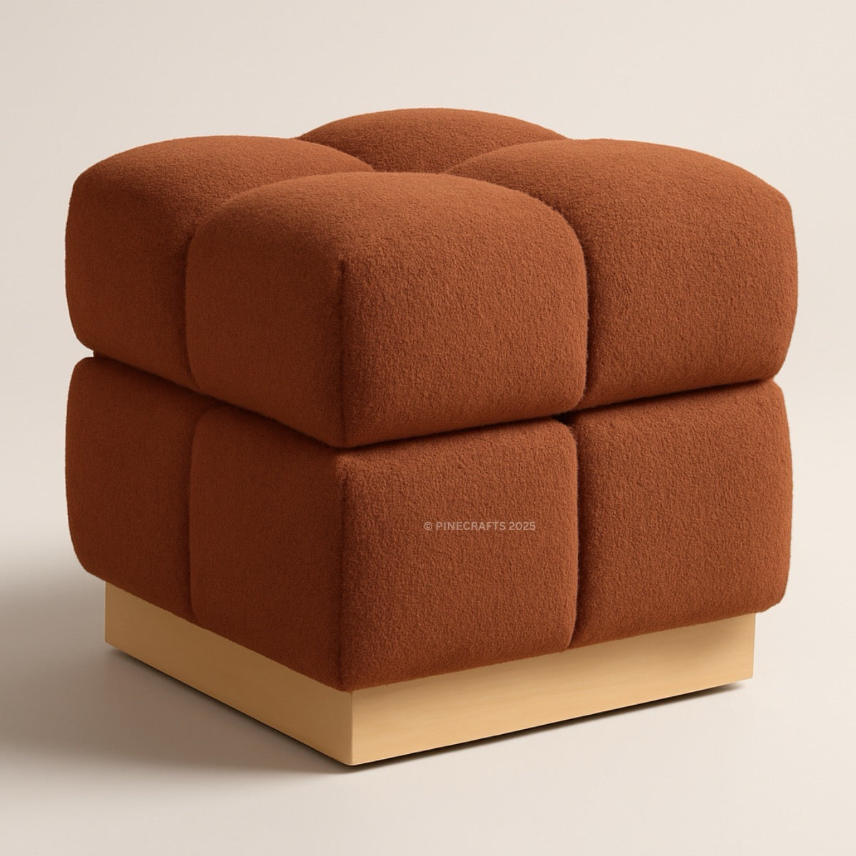 Brown cube-shaped ottoman on a beige background