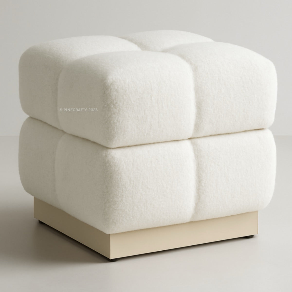 White textured ottoman on a gray background