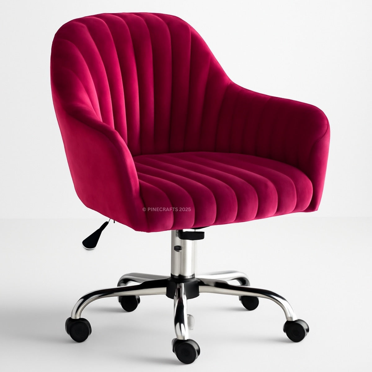 Red velvet office chair with chrome base on a white background