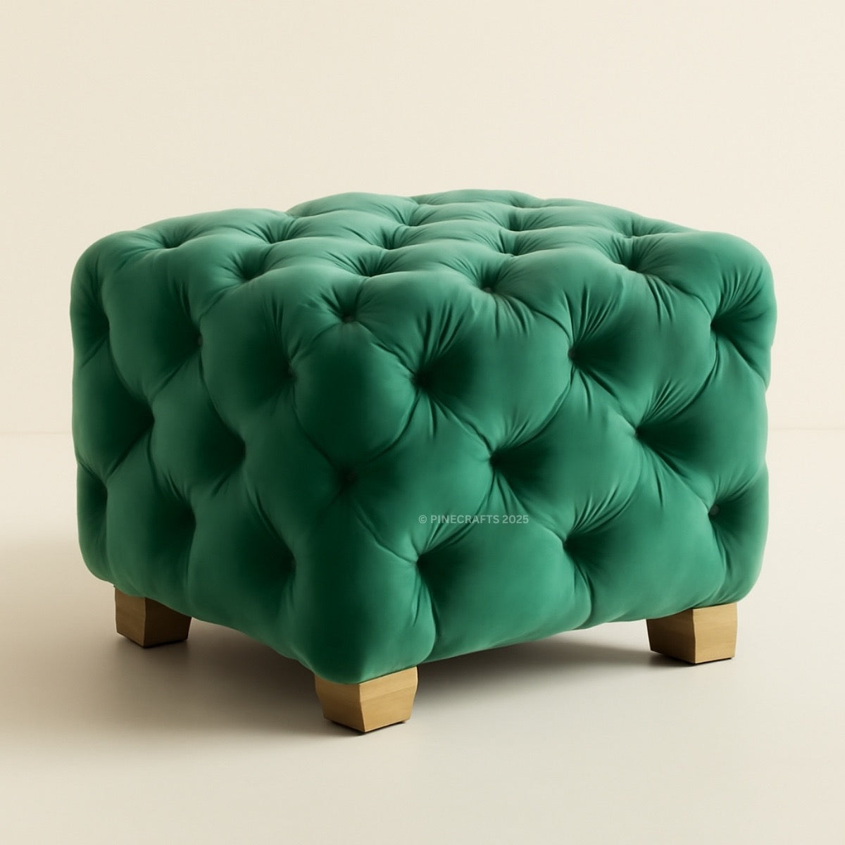 Green tufted ottoman on a beige background