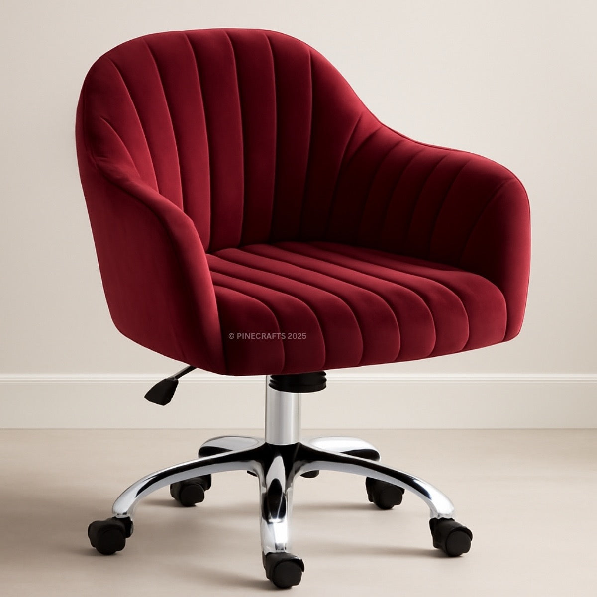Red velvet office chair with a chrome base on a beige background