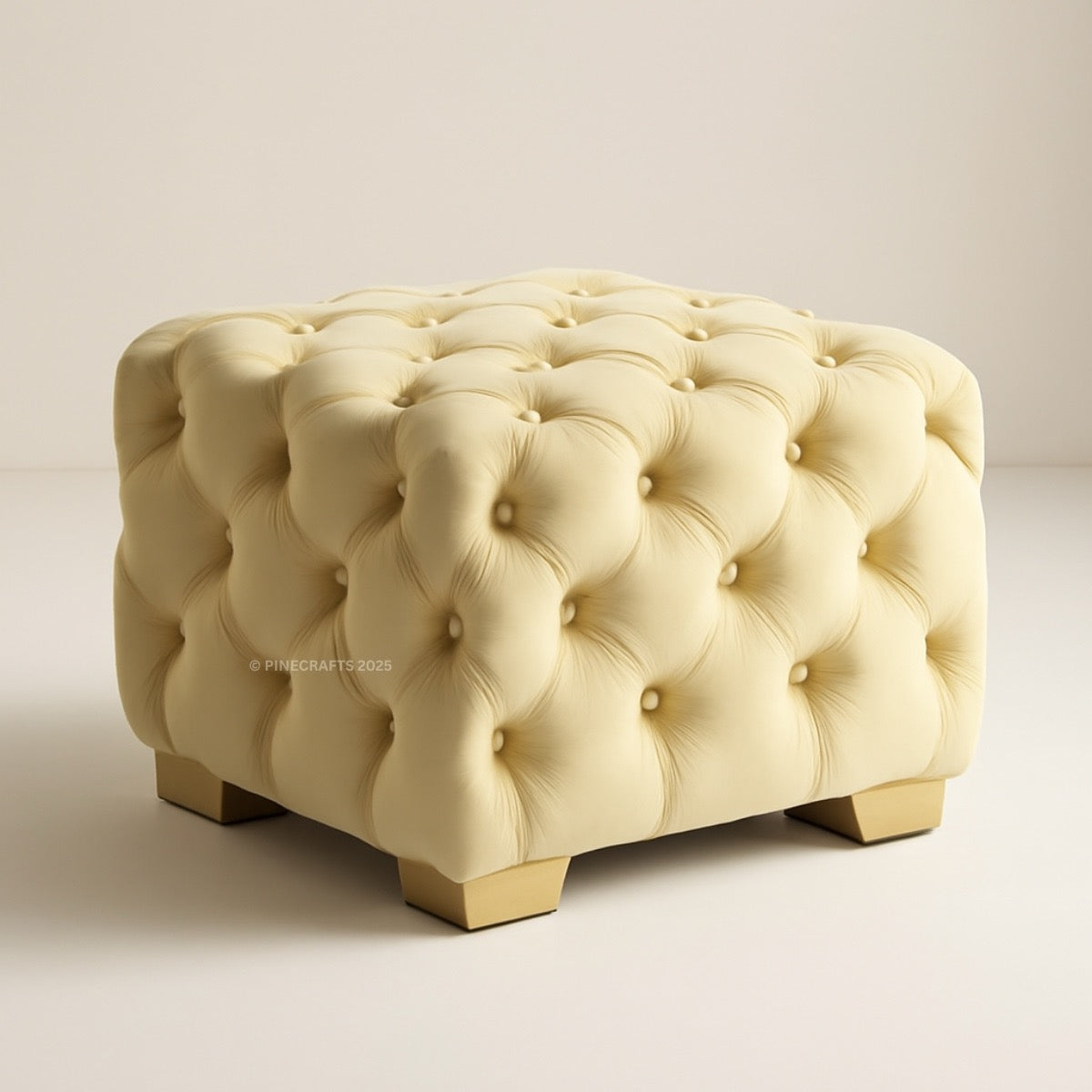 Beige tufted ottoman on a plain background