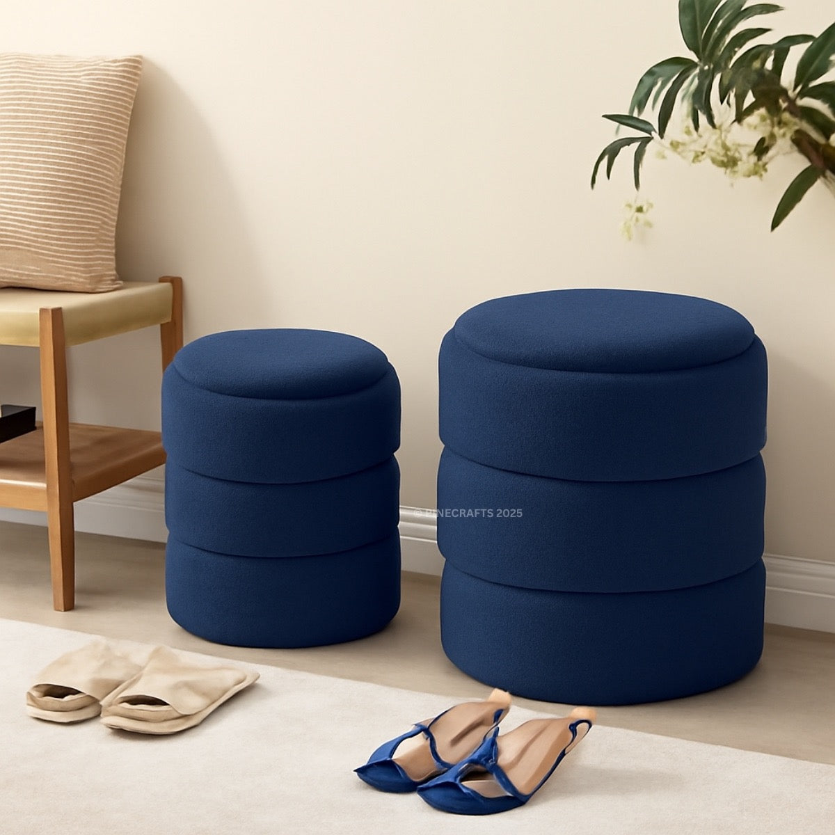 Two blue ottomans in a room with a wooden chair and shoes on the floor.