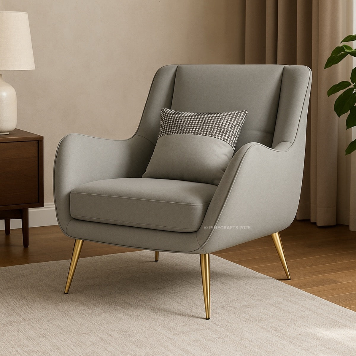 Gray armchair with gold legs in a room setting