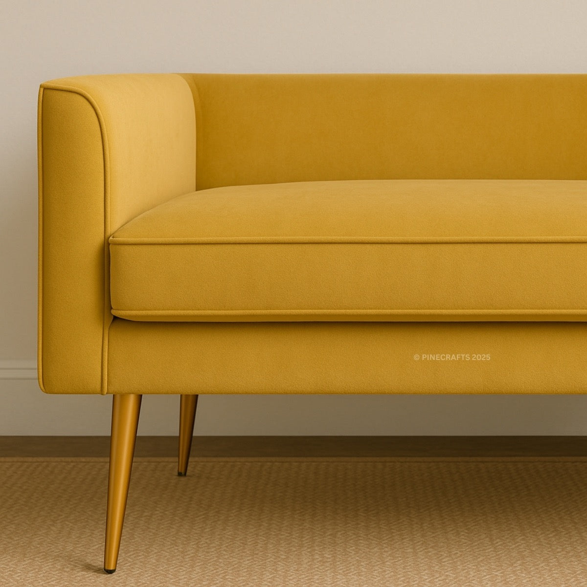 Yellow sofa with gold legs against a beige wall