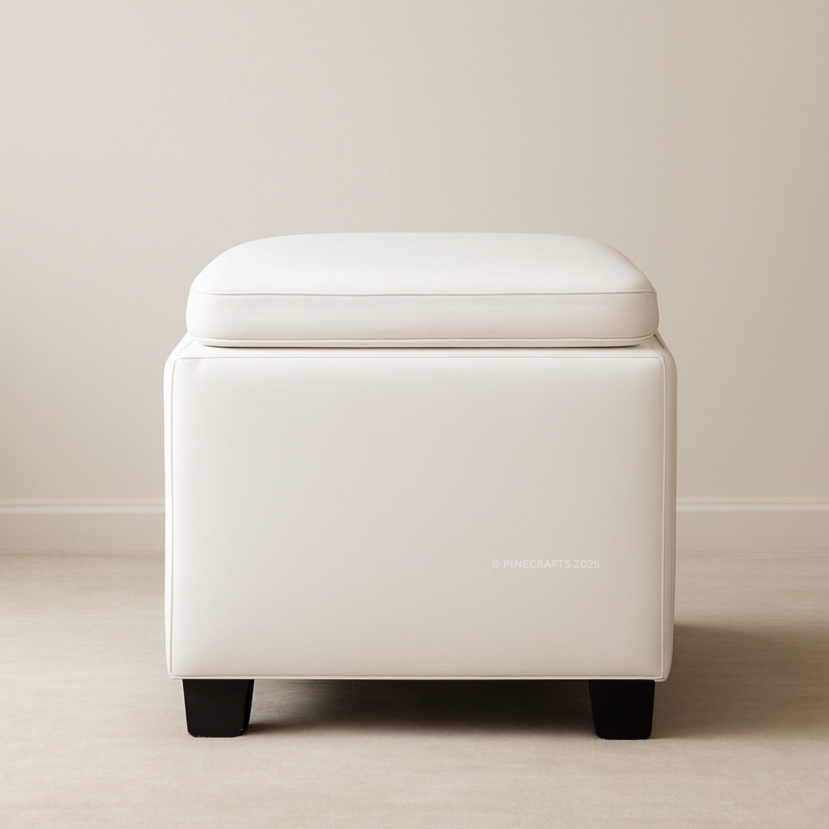 White storage ottoman with a lid on a beige background