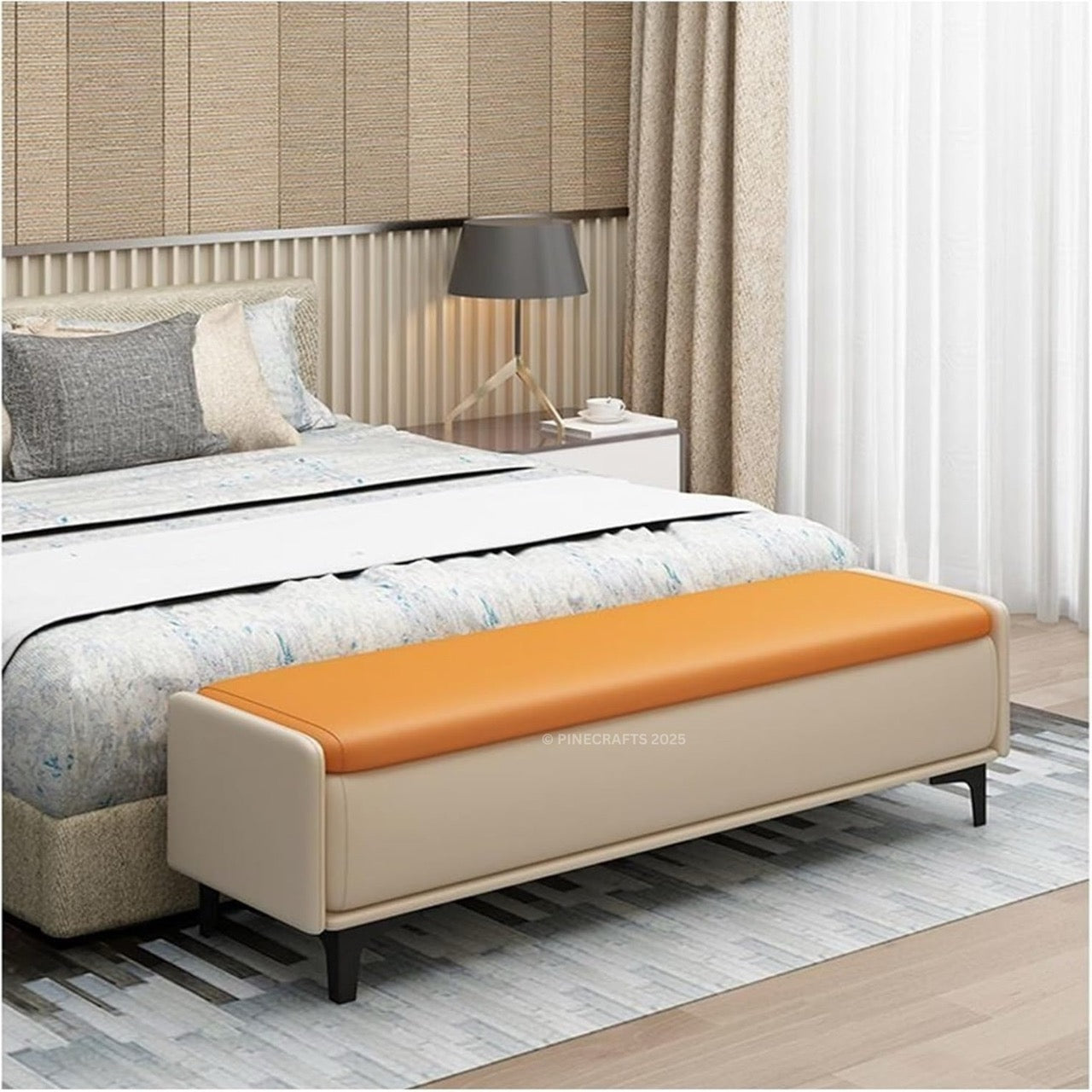 Beige bench with orange cushion in a bedroom setting