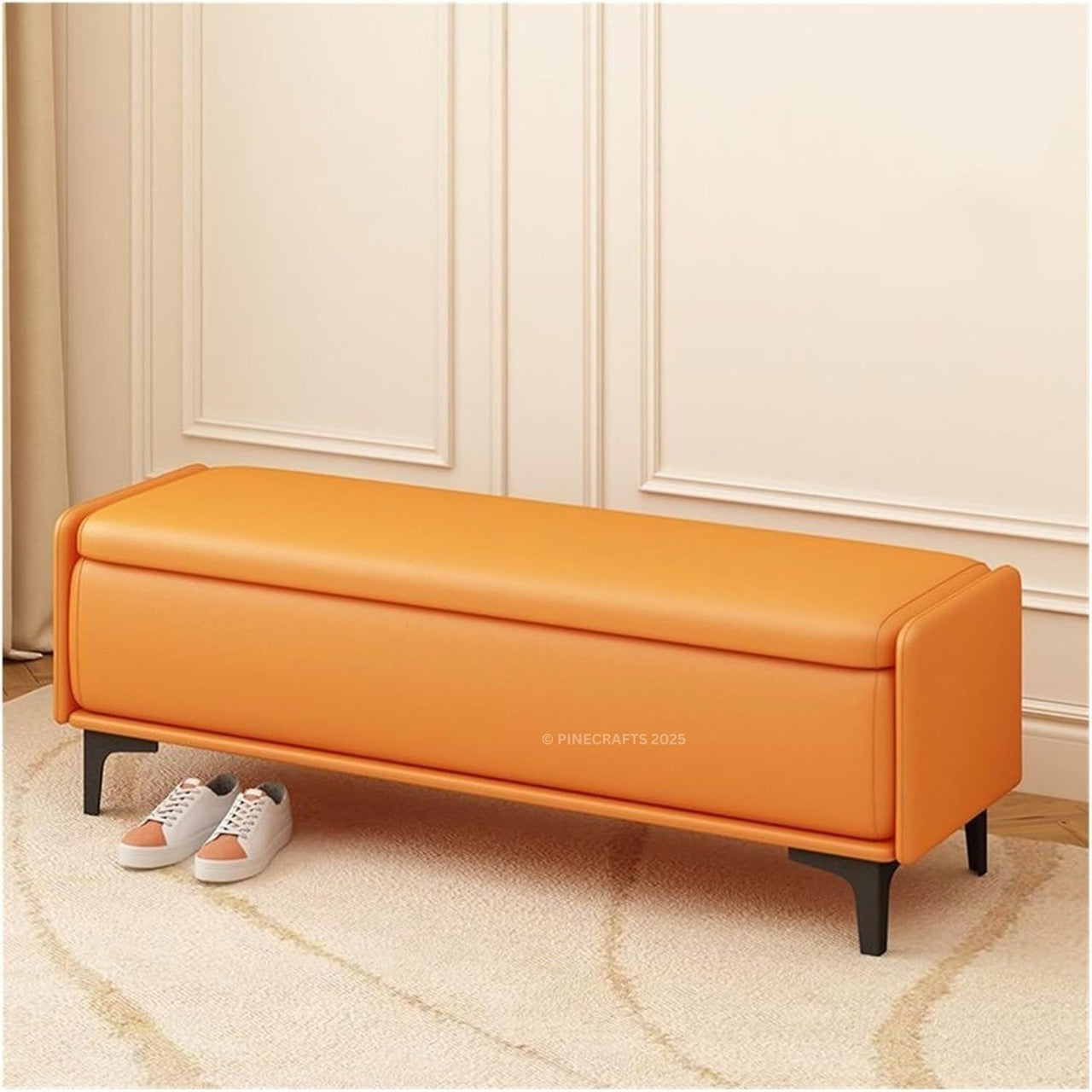 Orange storage bench in a room with beige walls and carpet.