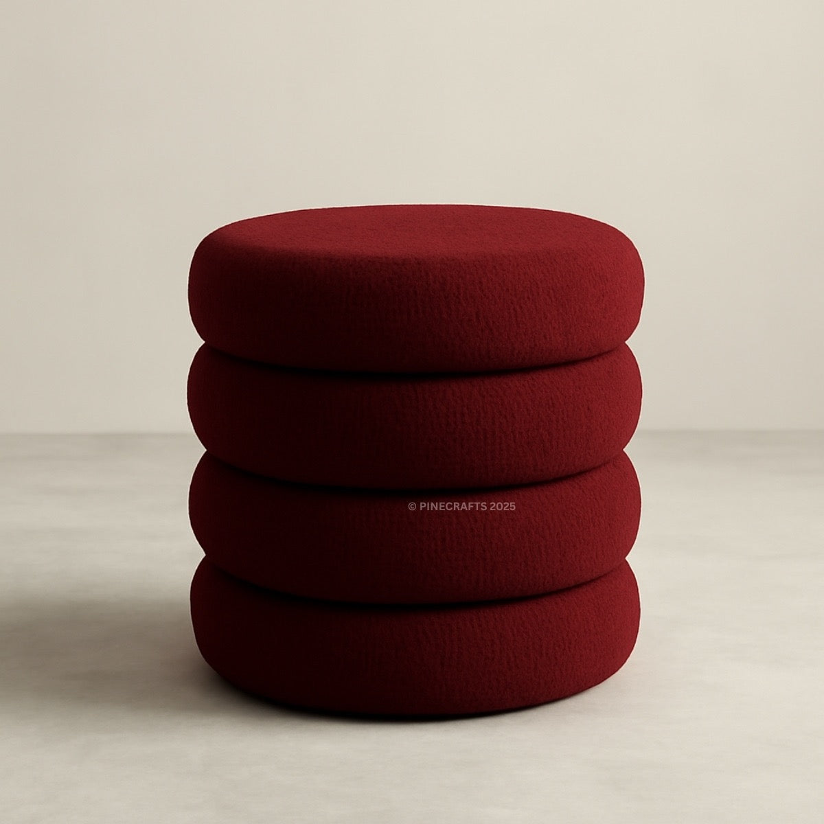 Stack of red cushions on a beige background