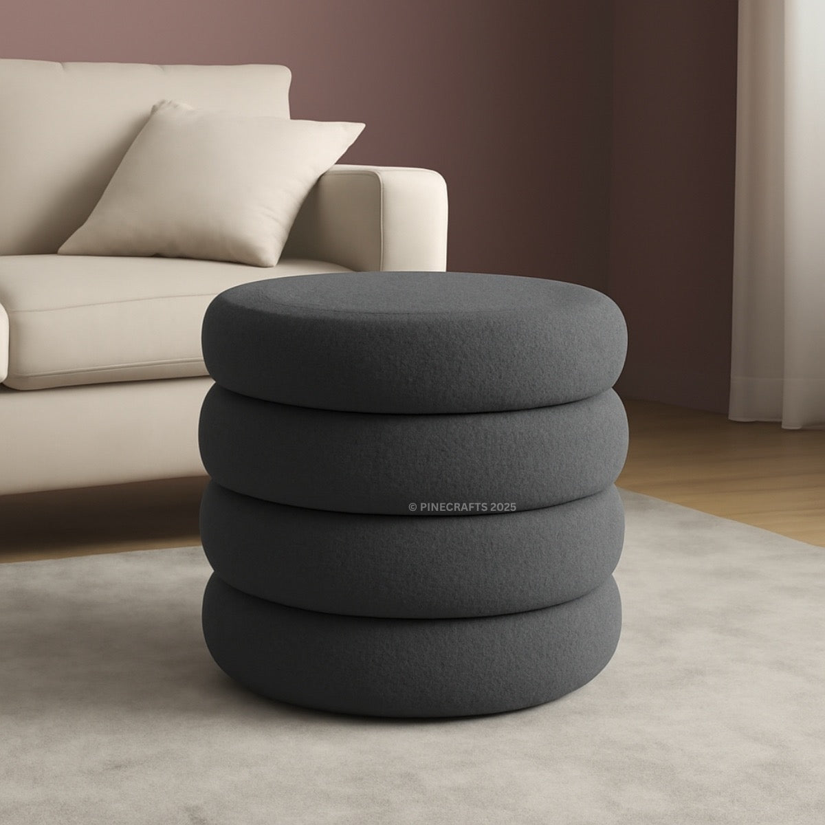 Stack of gray ottomans in a living room setting with a beige sofa.