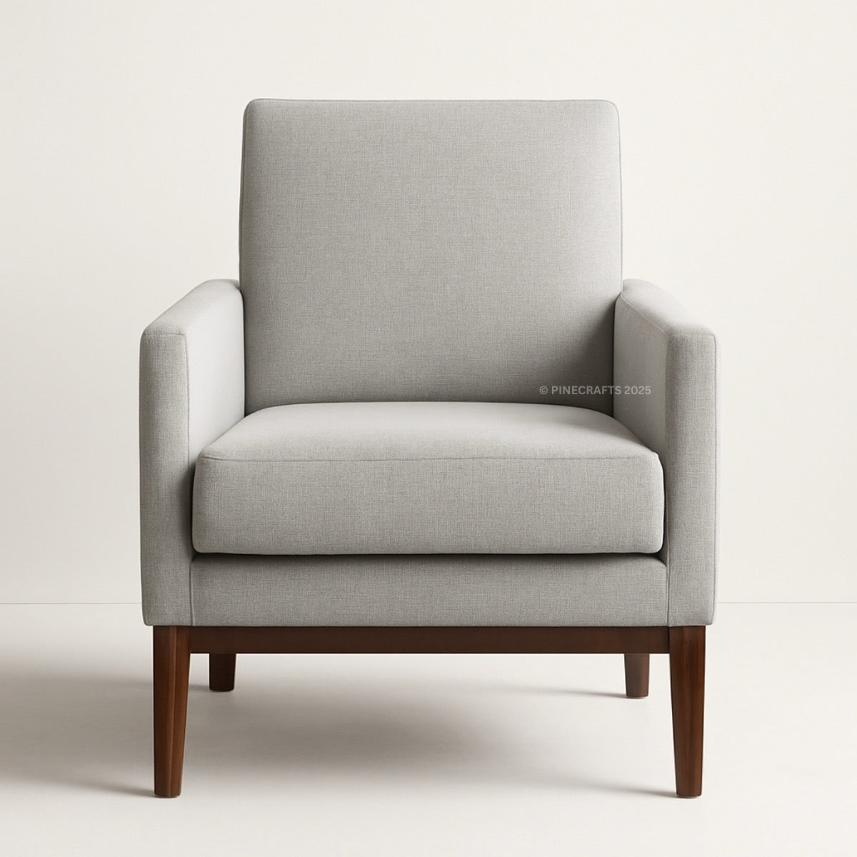 Gray armchair with wooden legs on a white background