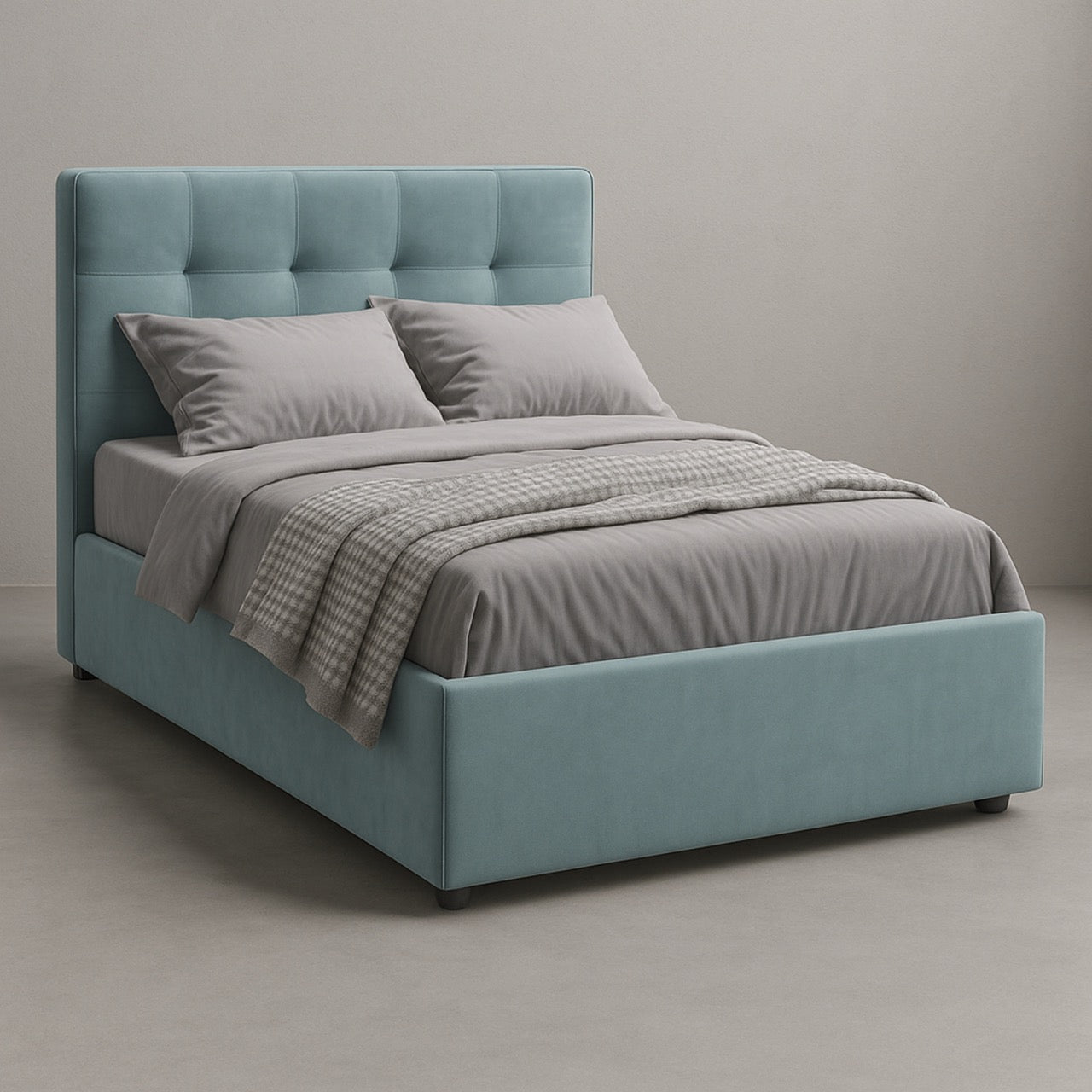 Blue upholstered bed with gray bedding against a neutral background