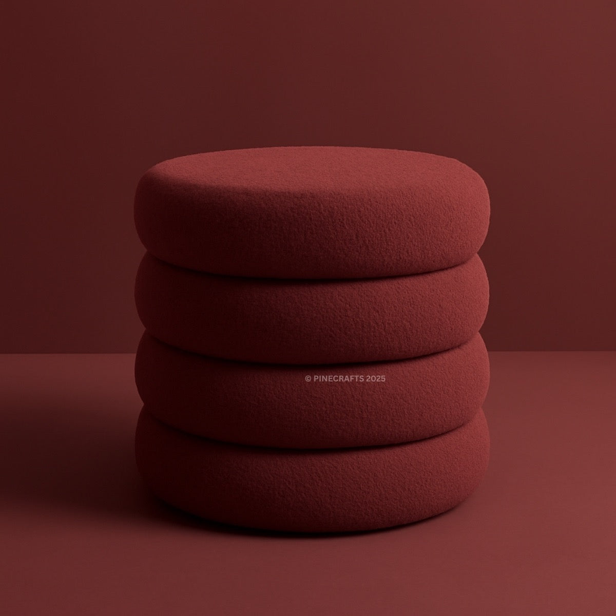 Stack of red cushions on a matching background
