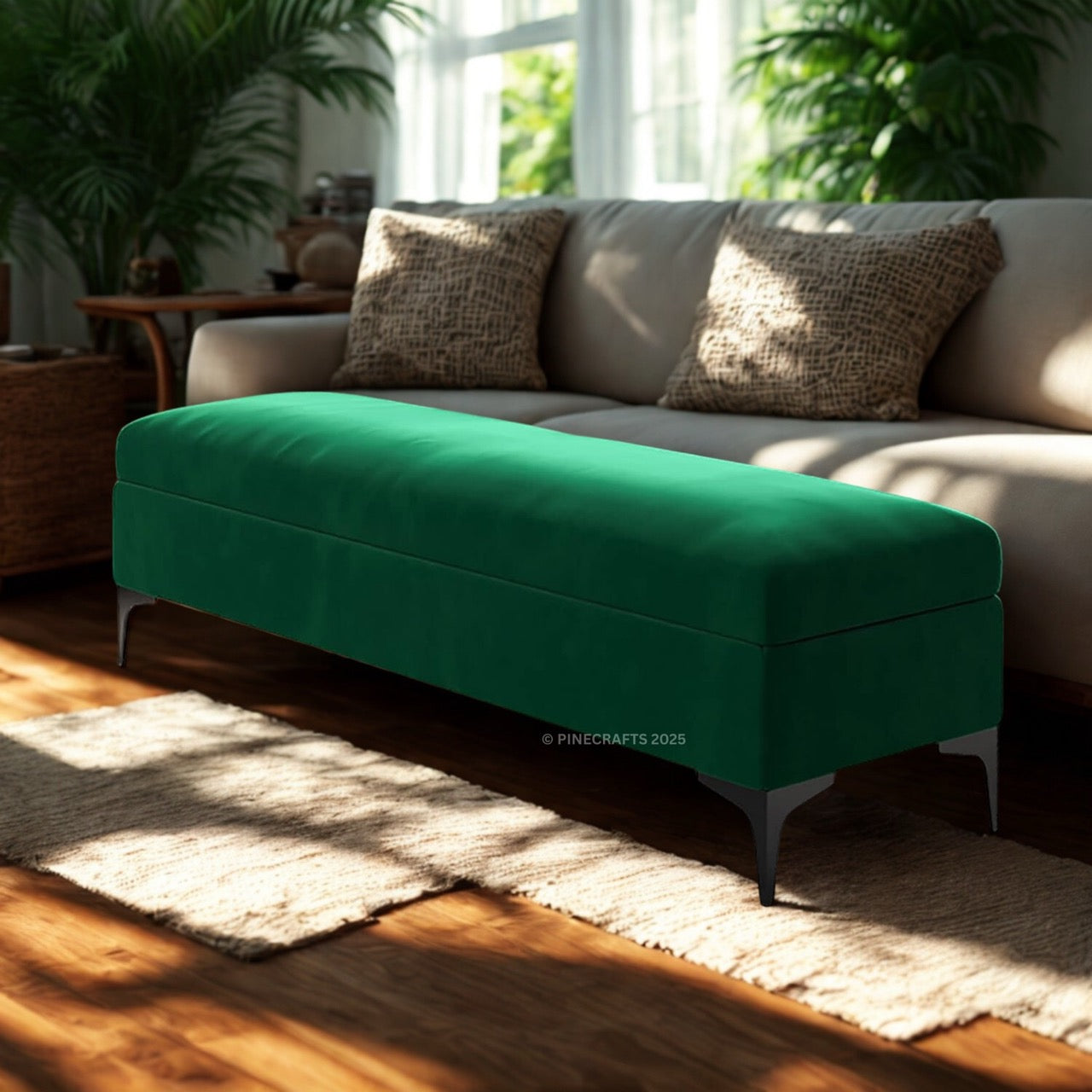 Green ottoman in front of a beige sofa with patterned cushions in a sunlit living room.