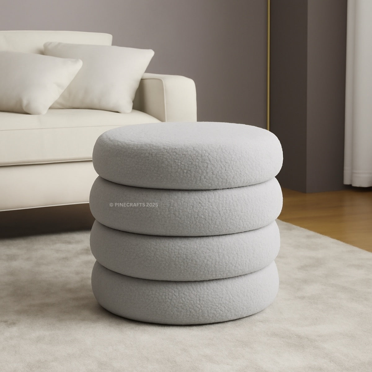 Stack of gray textured ottomans in a living room setting