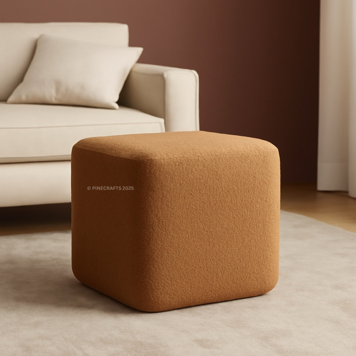 Brown cube-shaped ottoman in a living room setting with a beige sofa.