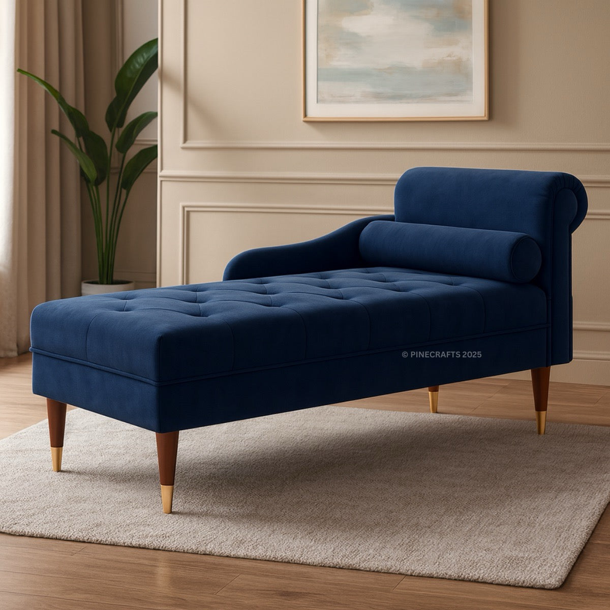 Blue chaise lounge in a room with a plant and painting on the wall.