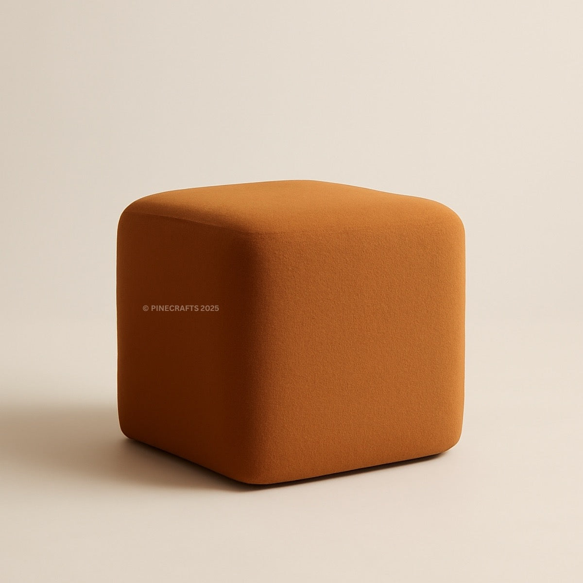 Brown cube-shaped ottoman on a beige background