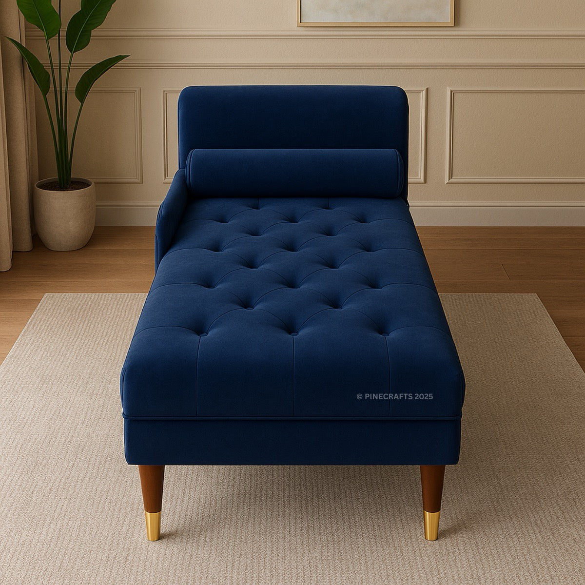 Navy blue tufted chaise lounge with wooden legs in a room setting.
