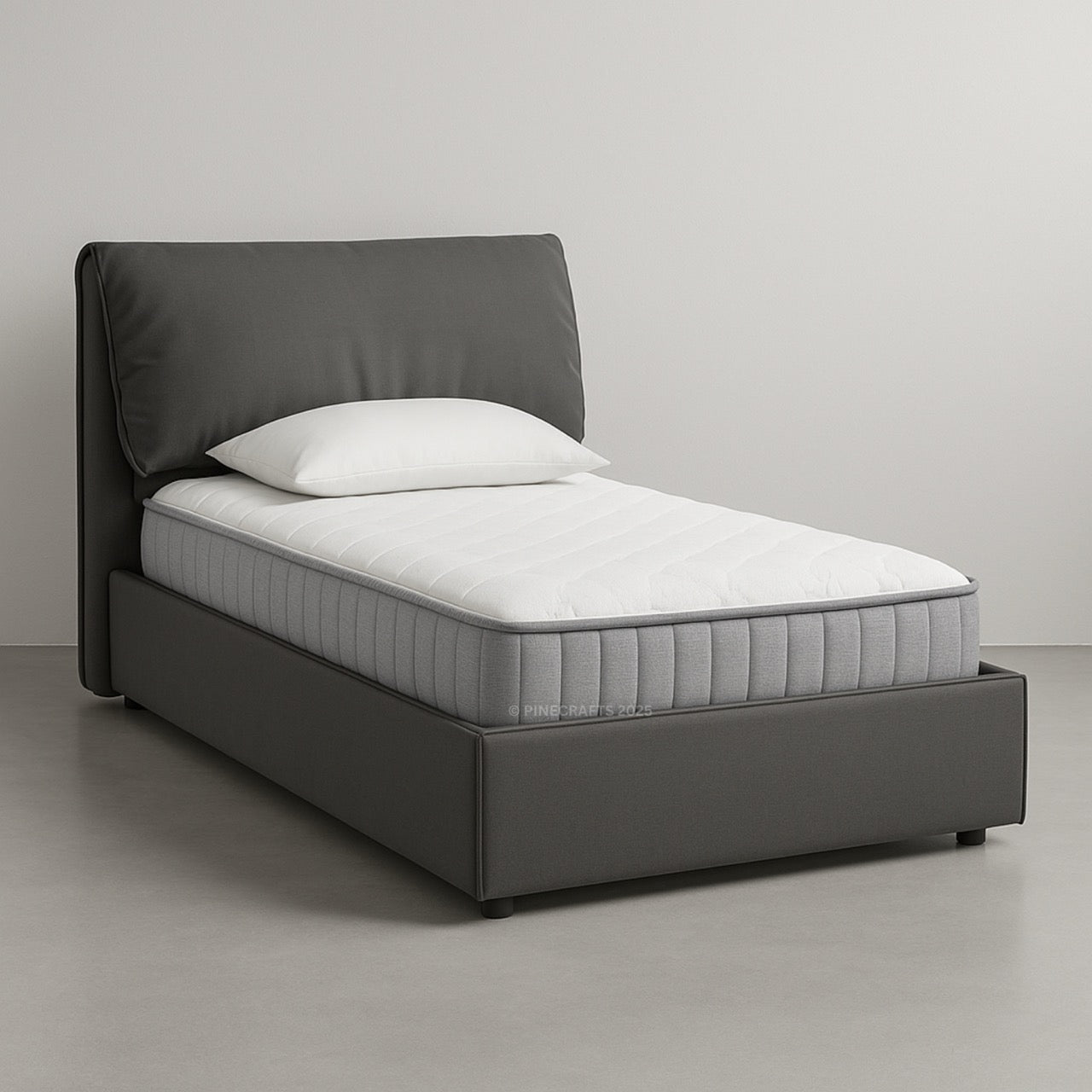 Gray bed frame with white mattress and pillow on a plain background