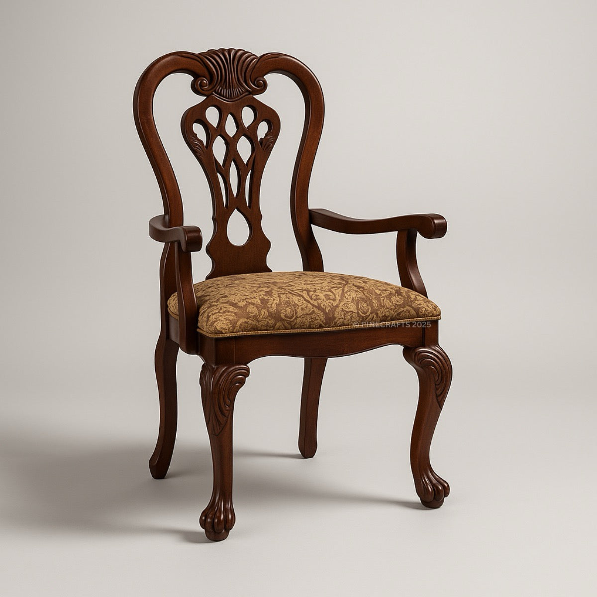 Wooden chair with intricate carvings and a patterned cushion on a plain background