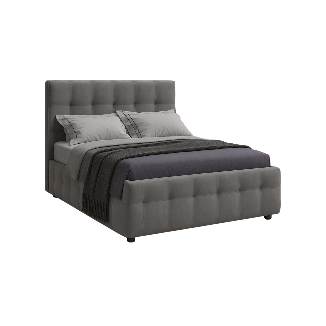 Gray upholstered bed with dark gray bedding on a white background