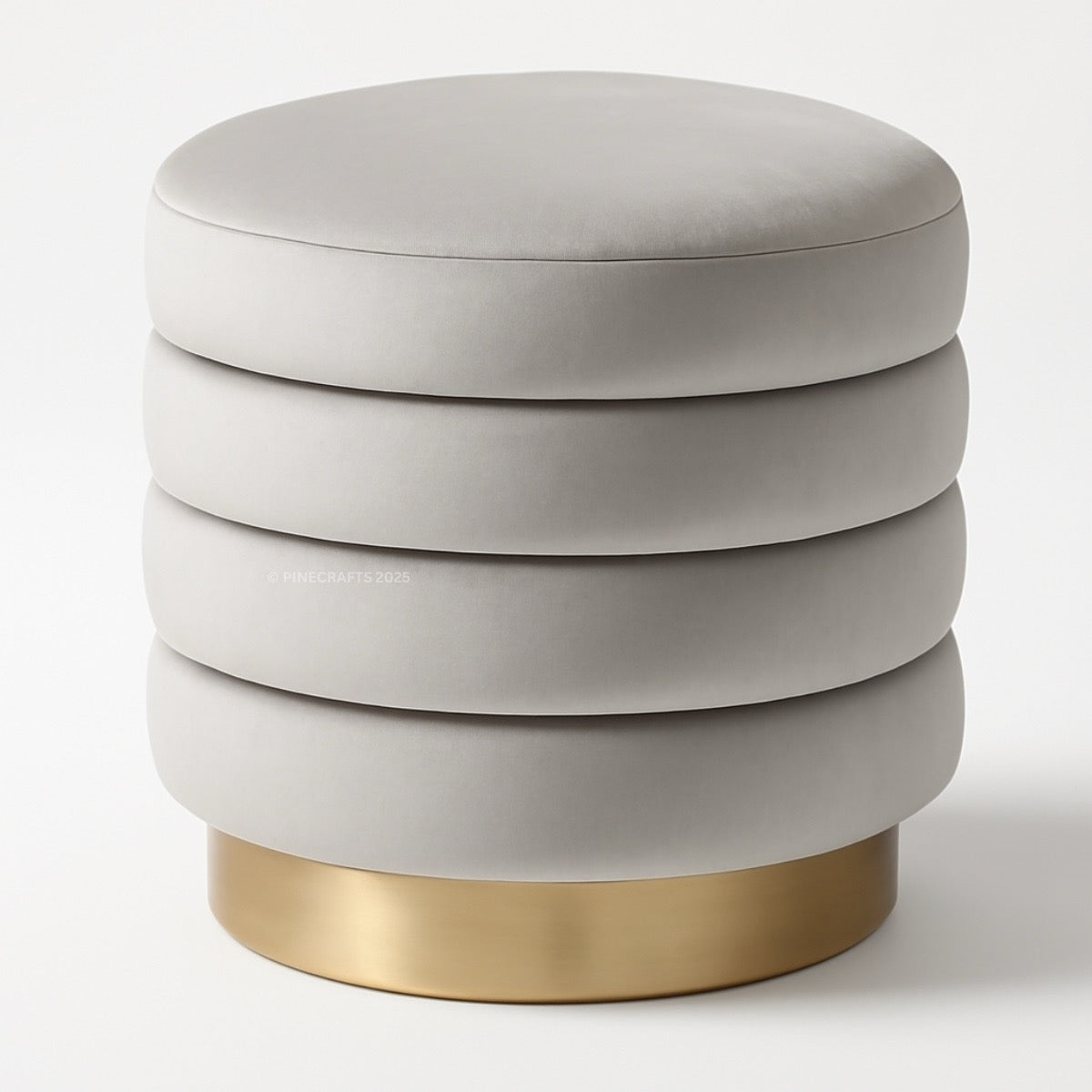 Round ottoman with stacked cylindrical design and gold base on a white background
