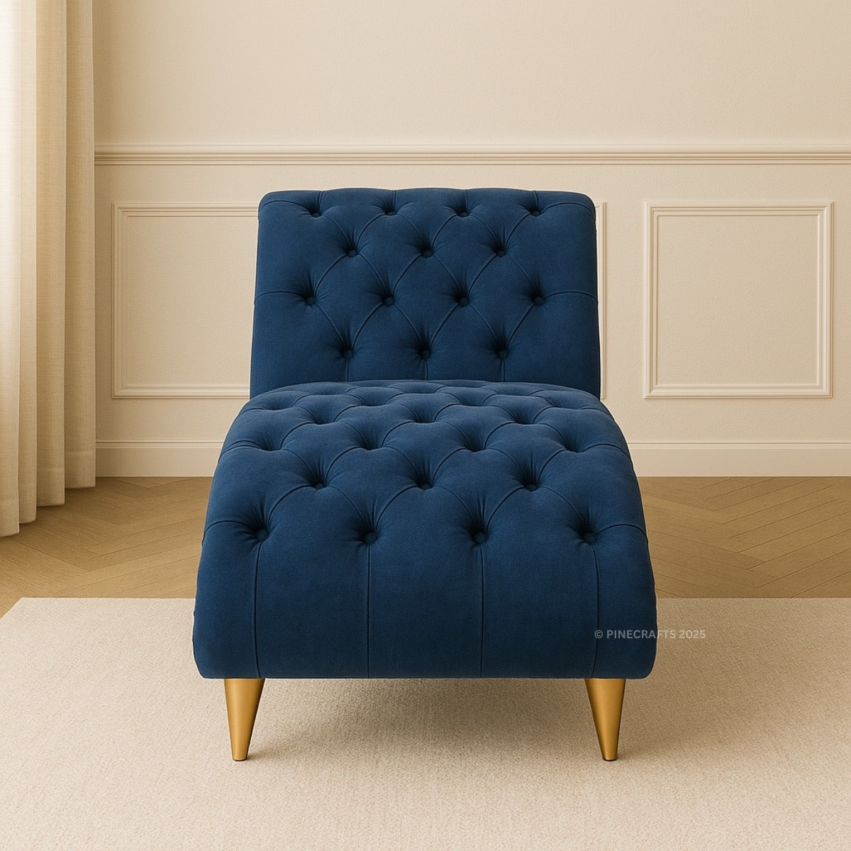 Blue tufted chair with gold legs on a beige carpet in a room with white walls and wooden floor.