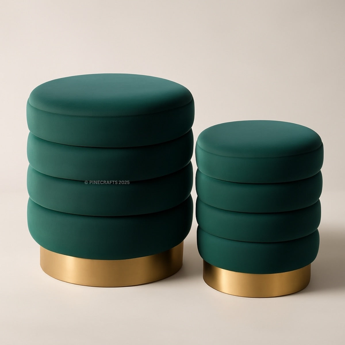 Two green stools with gold bases on a beige background