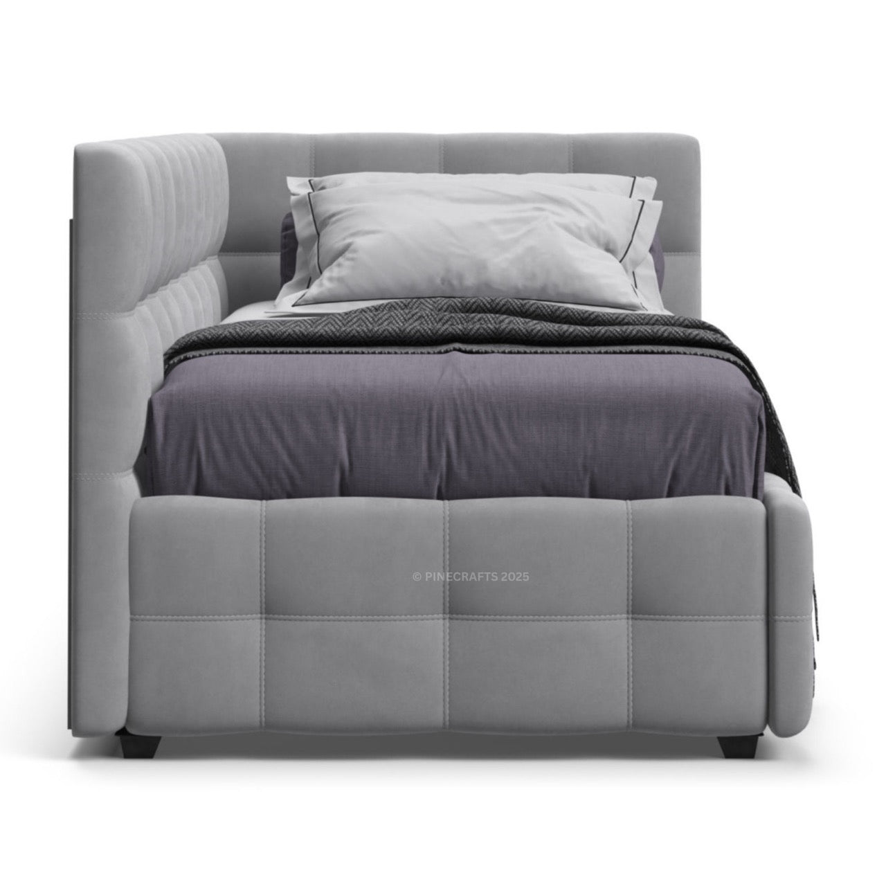 Gray upholstered bed with a blanket and pillow on a white background