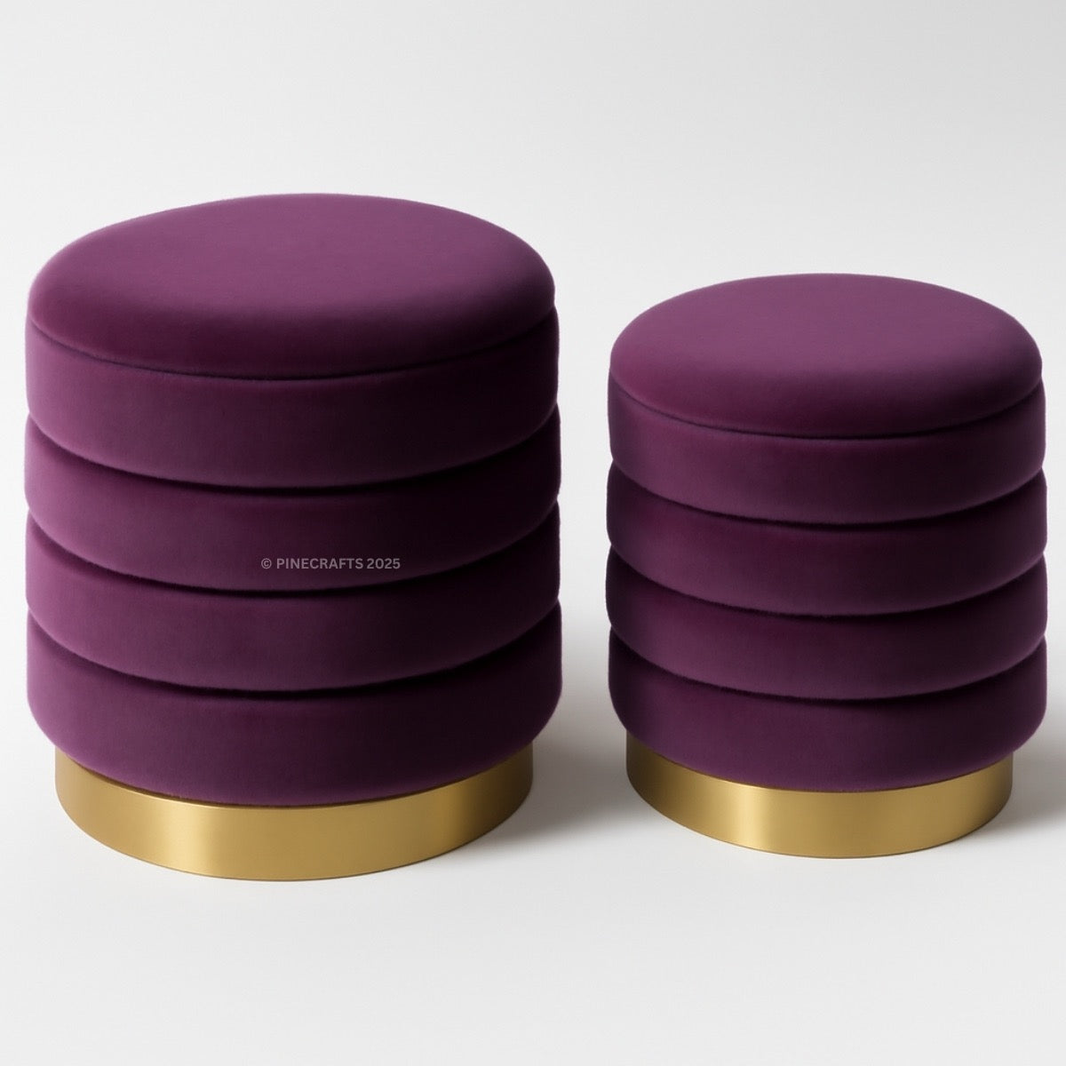 Two purple stools with gold bases on a white background