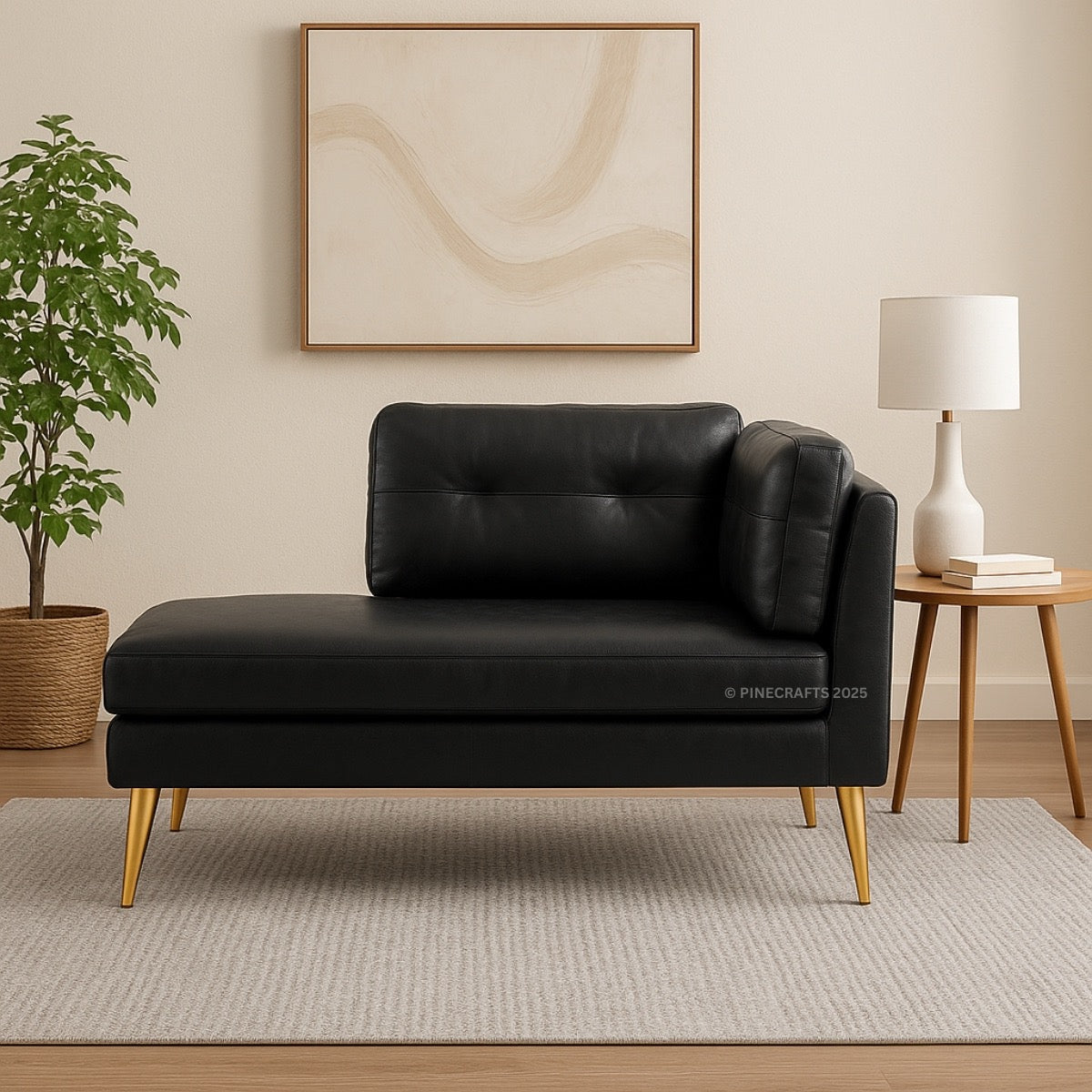 Black leather sofa in a living room setting with a plant, table, and lamp.