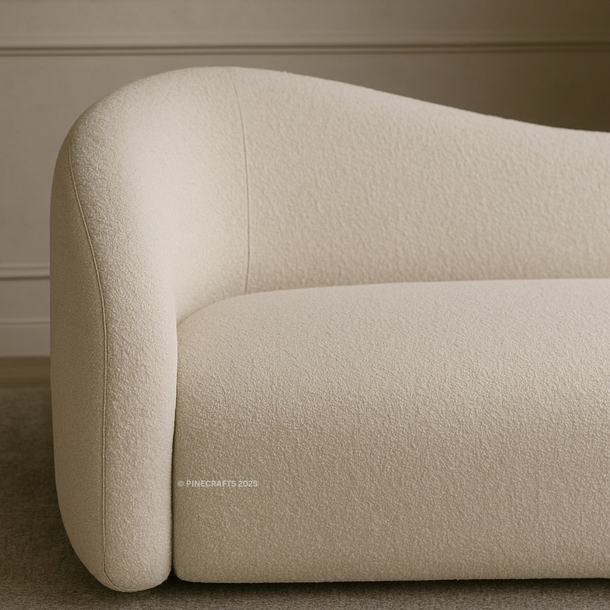 Beige sofa corner in a room with neutral walls