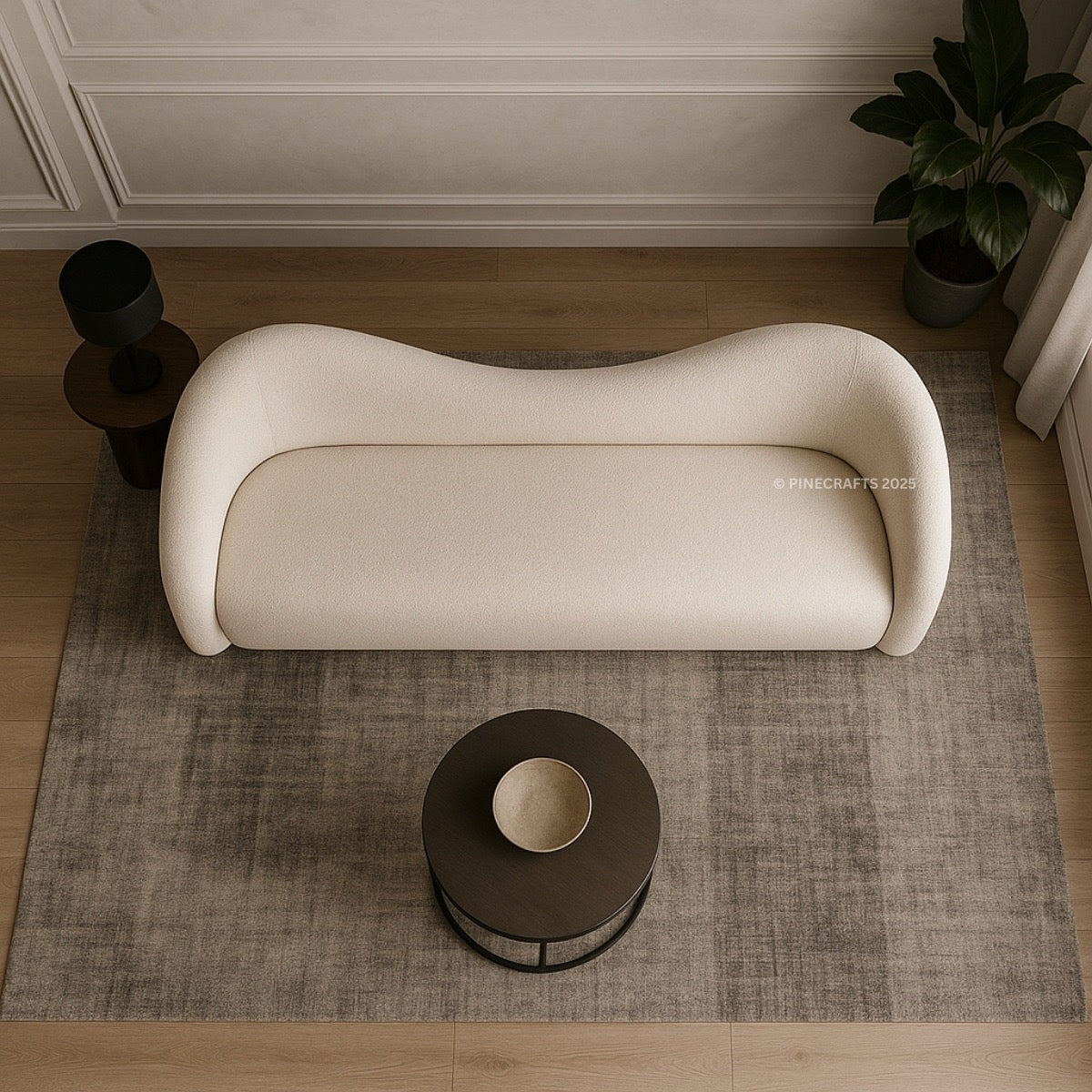 Modern white sofa in a room with a rug and small table