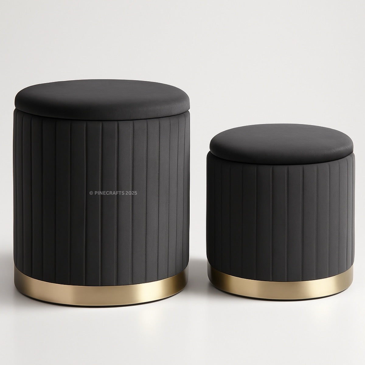 Two black stools with gold bases on a white background