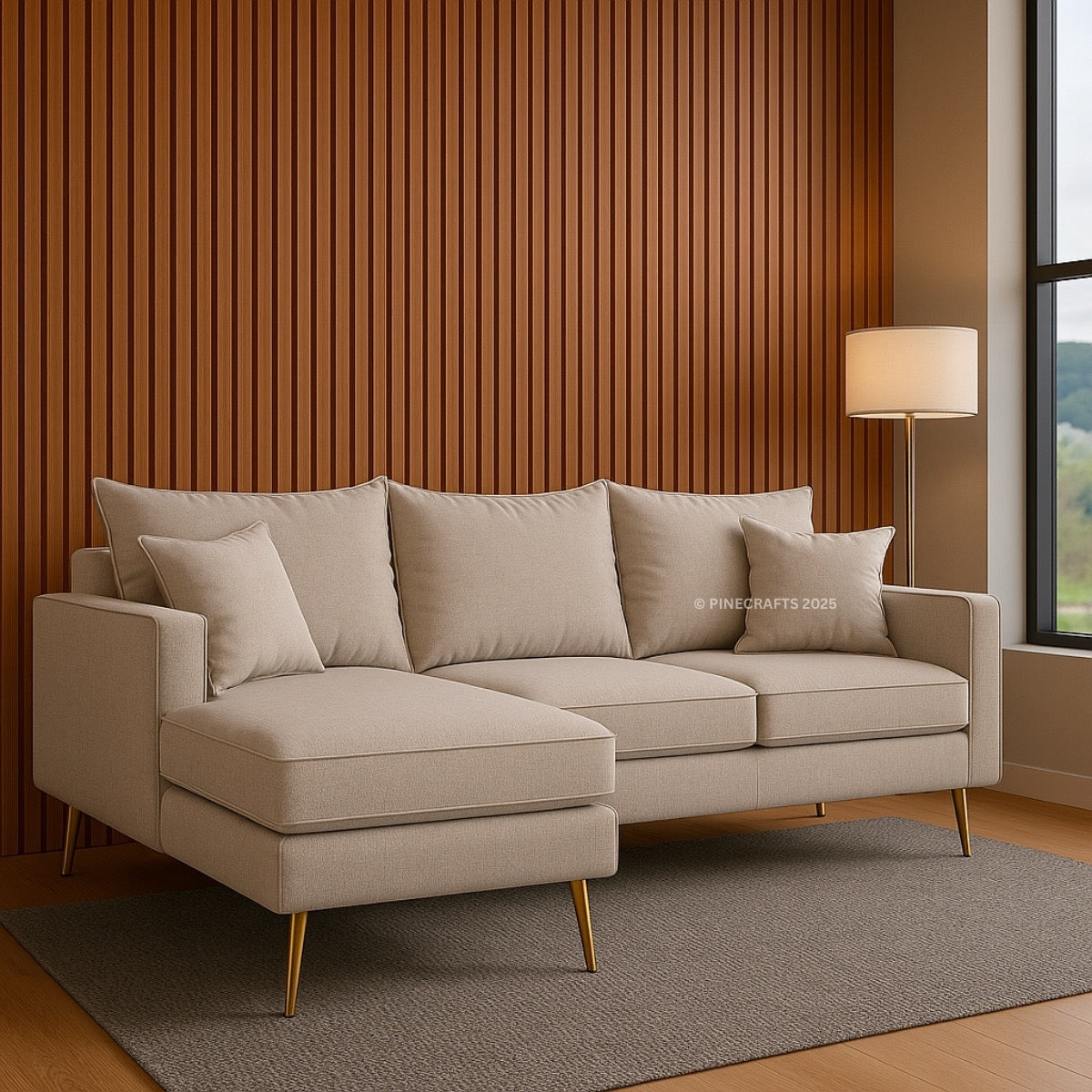 Beige sectional sofa in a living room with wooden wall and window.