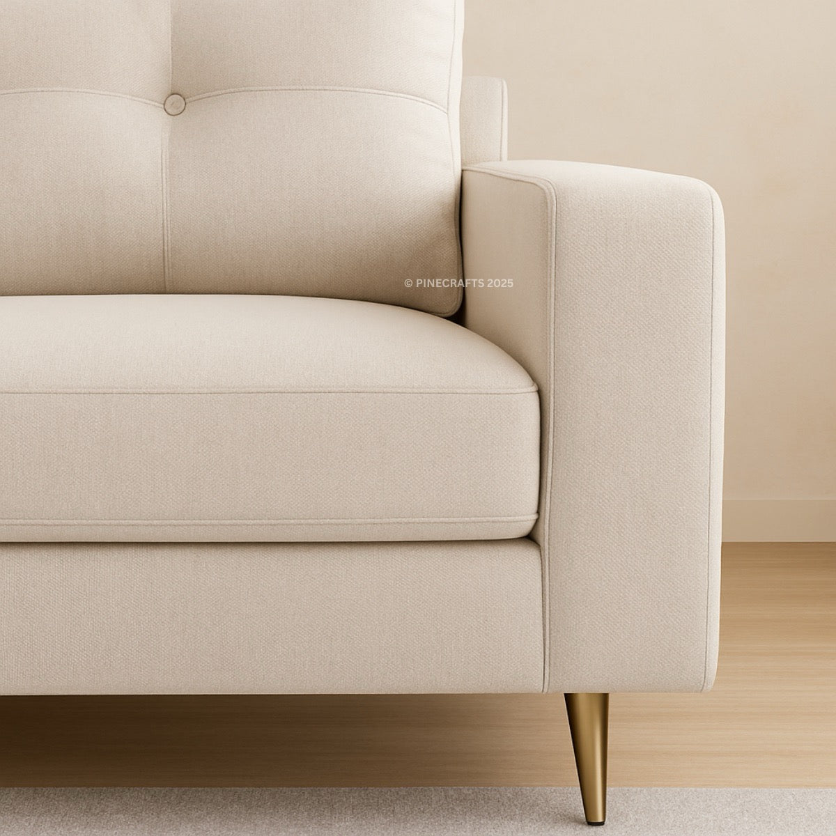 Beige sofa with gold legs on a neutral background