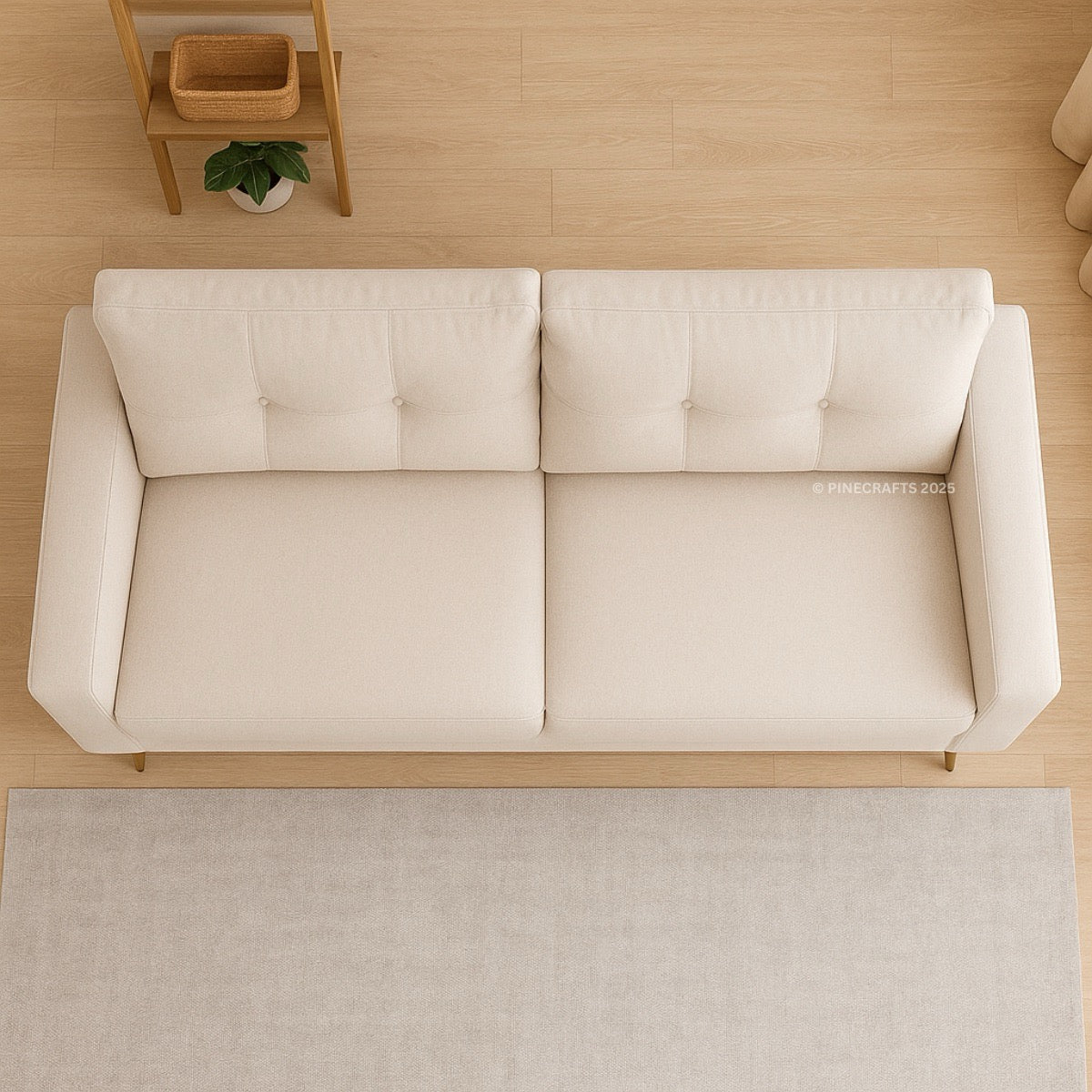 Beige sofa in a minimalistic room with wooden floor and plant