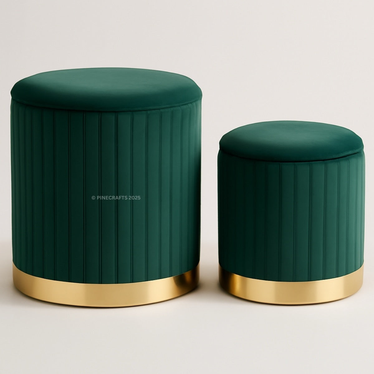 Two green ottomans with gold bases on a light gray background