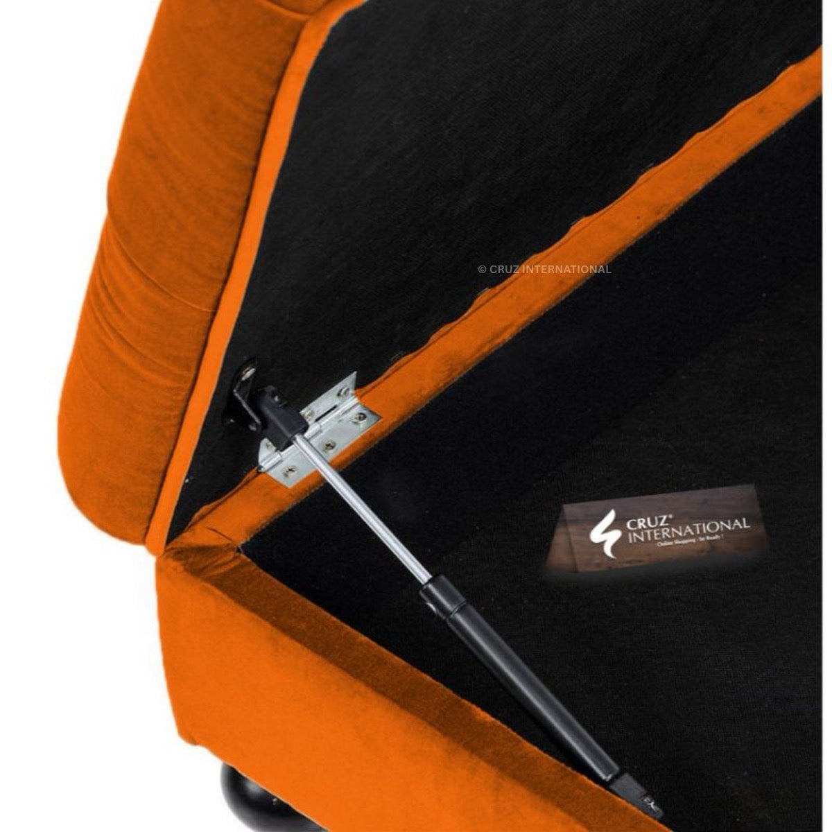 Close-up of an orange and black bag with a Cruz International label.