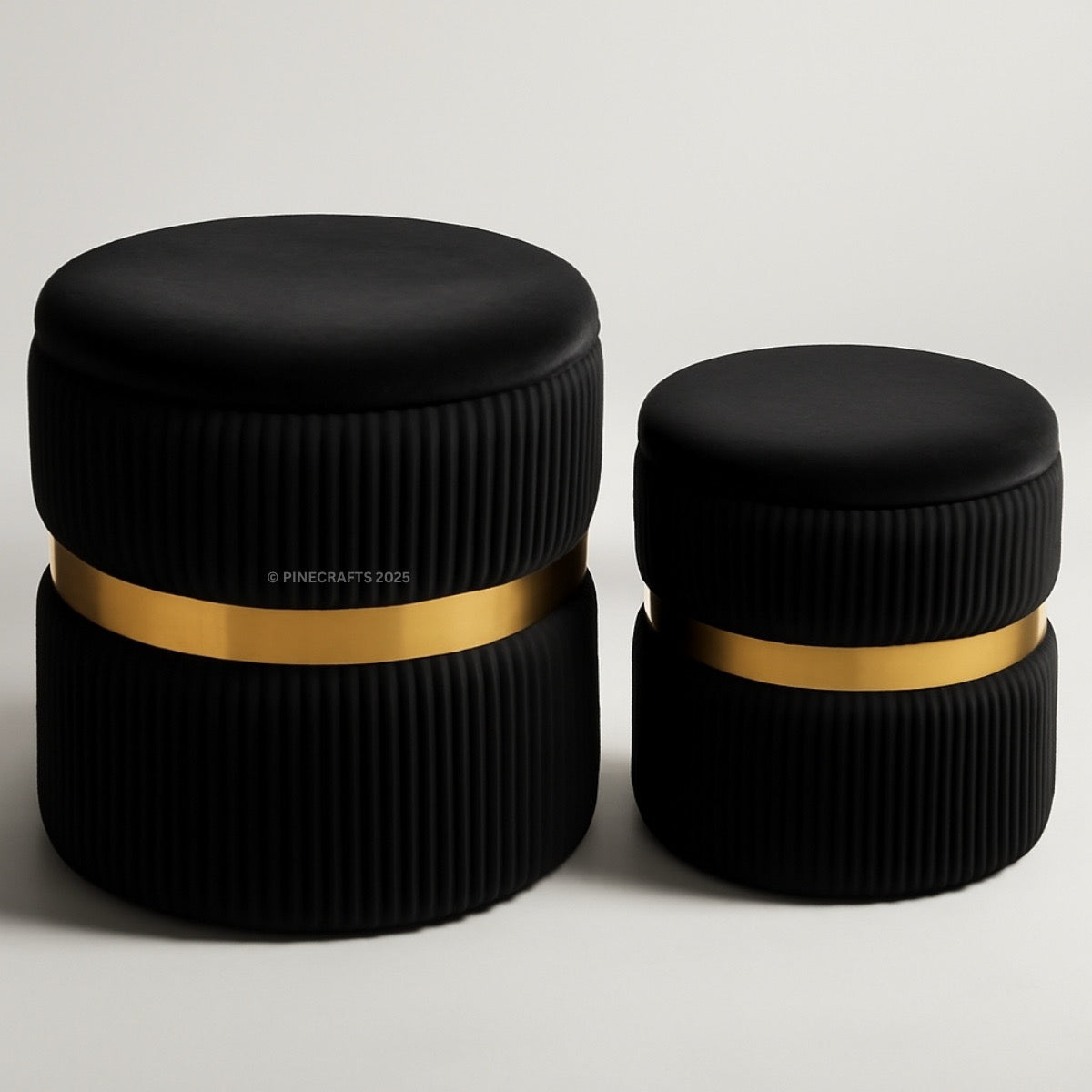 Two black containers with gold bands on a light gray background