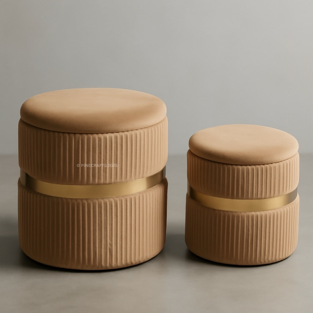 Two brown cylindrical ottomans with ribbed texture on a gray background