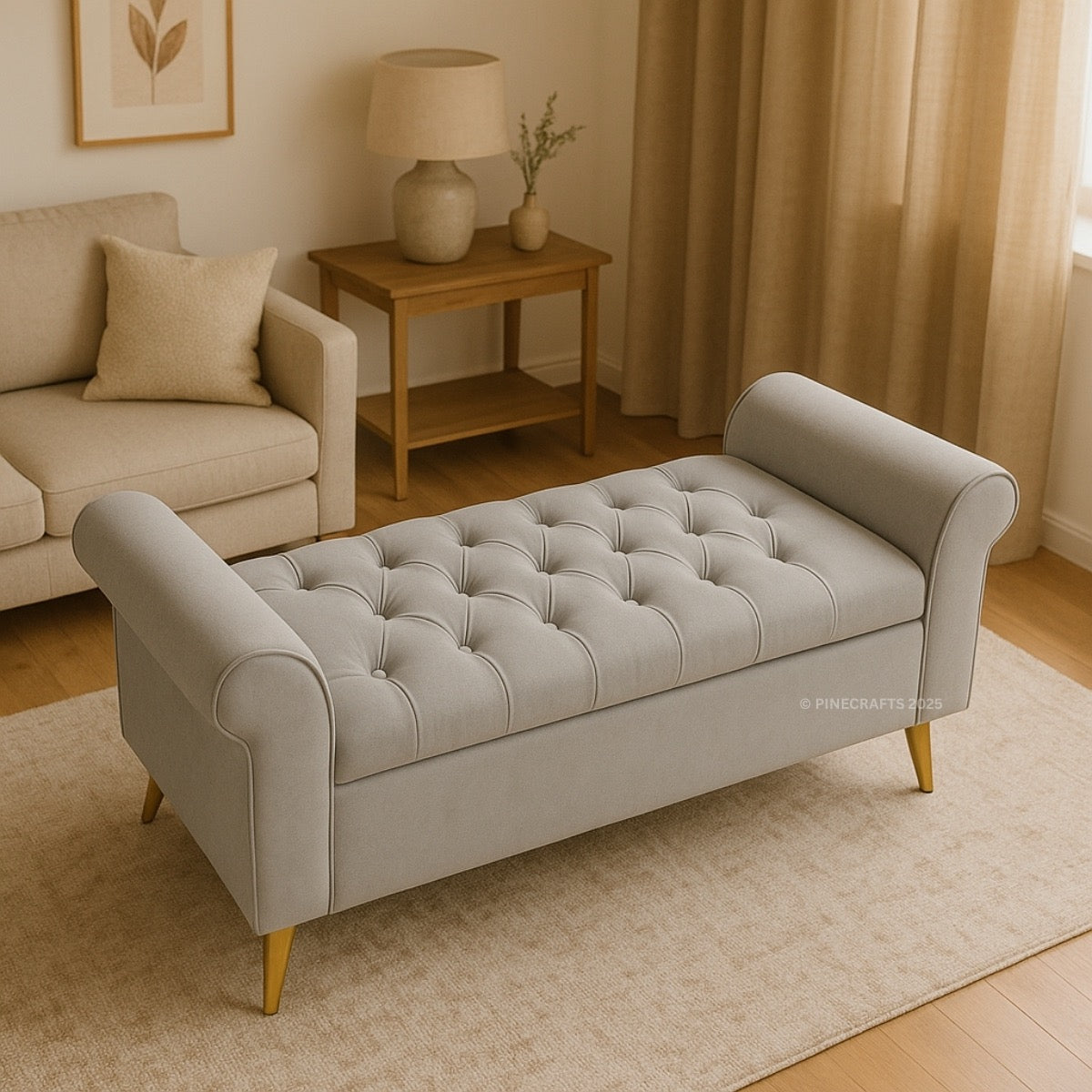 Gray tufted bench in a living room setting with beige sofa and wooden side table.