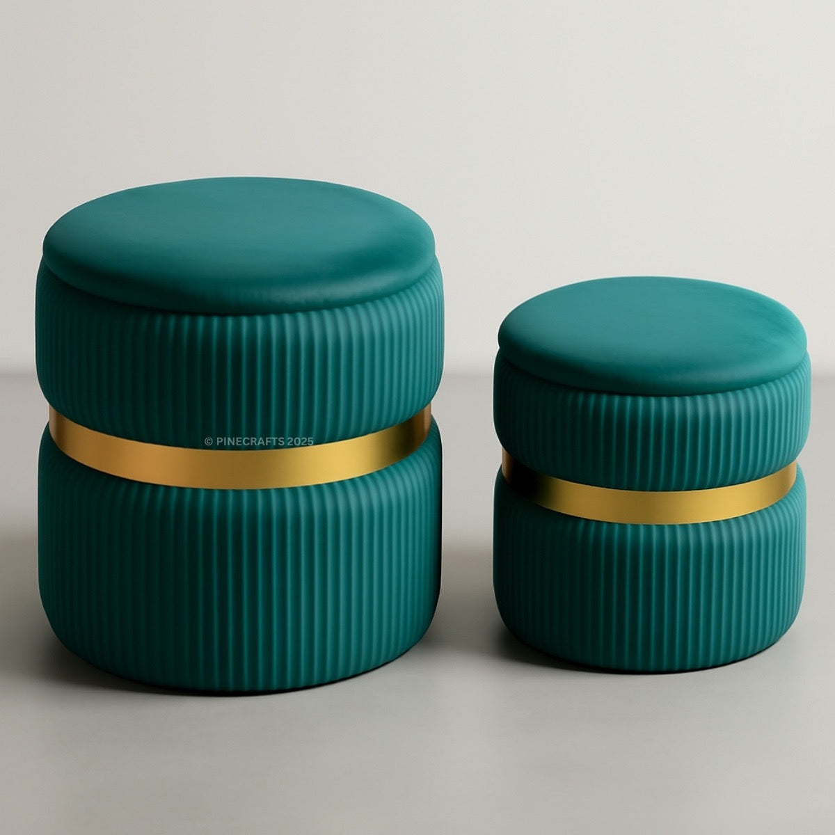 Two teal containers with gold bands on a light gray background