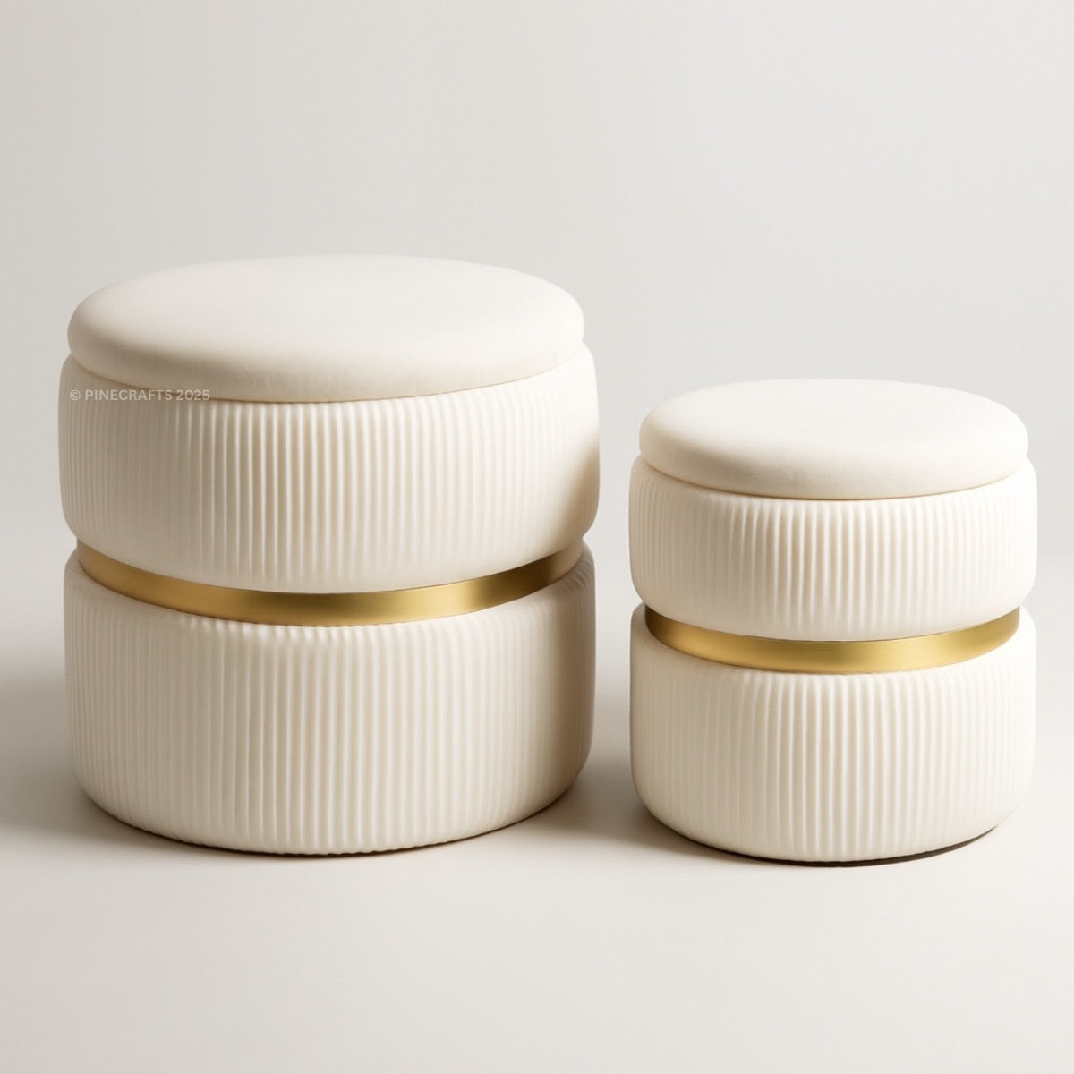 Two white ceramic containers with gold bands on a light gray background
