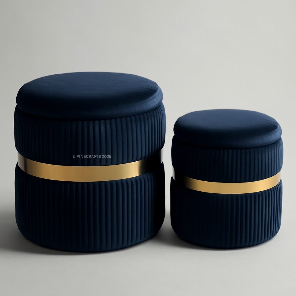Two navy blue containers with gold bands on a light gray background