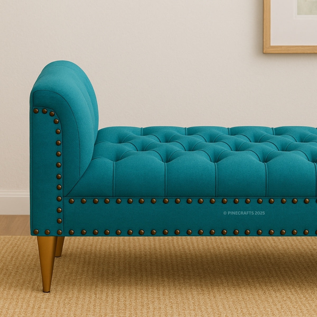 Teal tufted bench with nailhead trim on a beige carpet