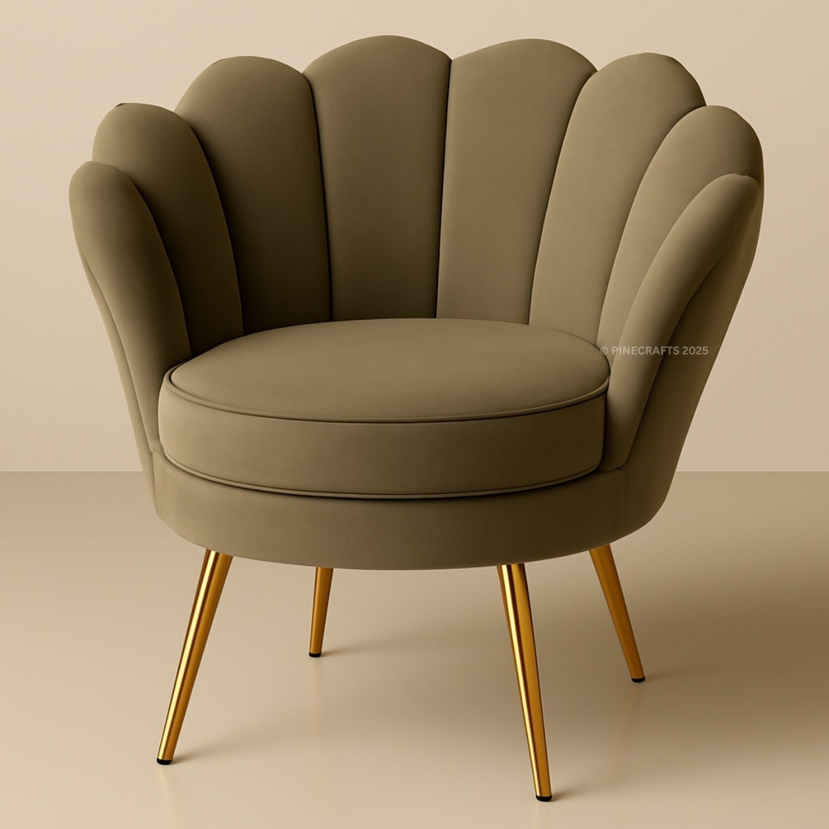 Green armchair with scalloped backrest and gold legs on a beige background